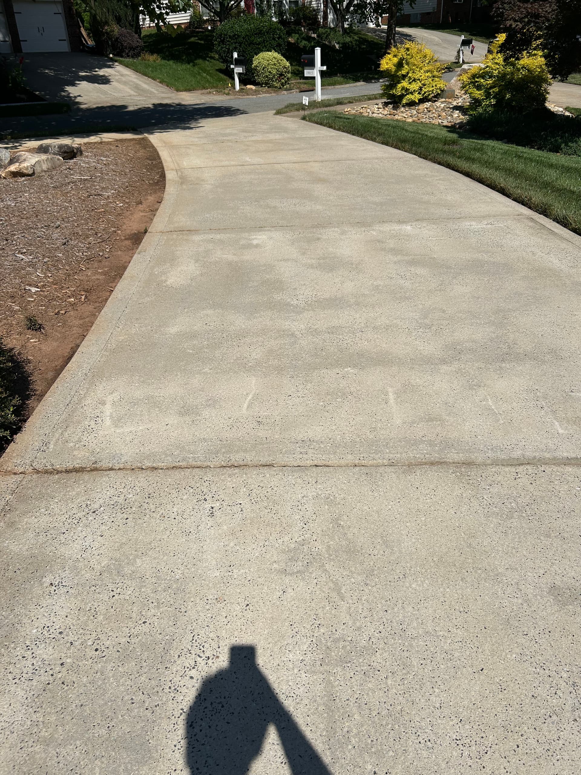 Gallery photos for Driveway Pressure Washing Wipes Out Algae and Grime in Cornelius: Image #1